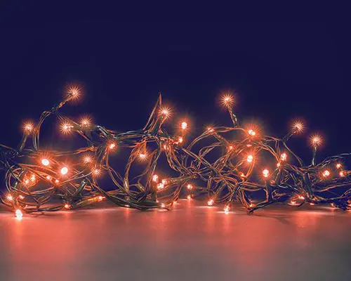 Jardin déco：Guirlande lumineuse animée à 64 LED cuivre sur câble vert Flicker Light® - 5 m