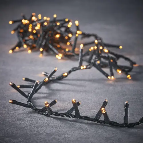 Style pour le jardin:Guirlande flicker snake light animée 700 LED blanc orangé sur câble noir - 14 m